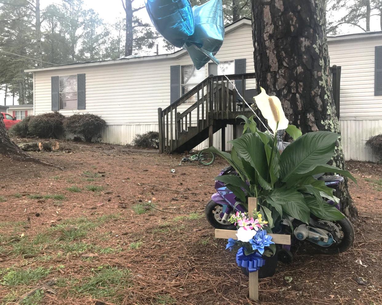 A 3-year-old boy was slain in this home March 8 in Athens after police said gang members riddled the home with bullets.