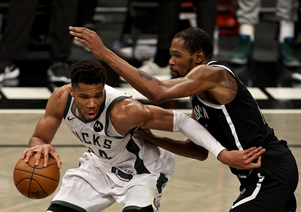 Giannis Antetokounmpo and Kevin Durant met in an instant classic Game 7 of the Eastern Conference finals. (Elsa/Getty Images)