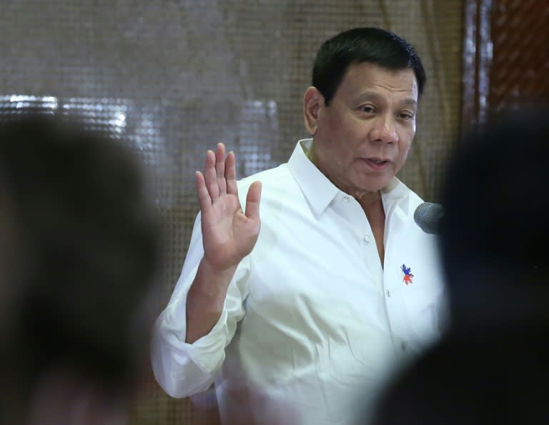 Philippine President Rodrigo Duterte warned China against attacking the Philippines, saying his forces would not submit without a fight