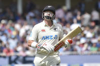 New Zealand's Henry Nicholls returns to the pavilion after being dismissed by England's Ben Stokes caught England's Ben Foakes for 30 runs during the first day of the 2nd test match between England and New Zealand at Trent Bridge in Nottingham, England, Friday, June 10, 2022. (AP Photo/Rui Vieira)