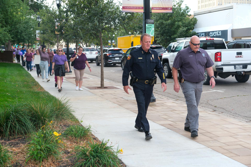 Amarillo Police Chief Martin Birkenfeld leads the Community Walk Against Domestic Violence on Monday afternoon in downtown Amarillo.