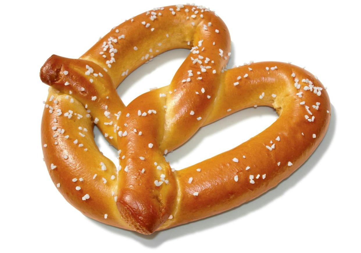 The pretzel has had a twisted path from Germany to global snack food. <a href="https://www.shutterstock.com/image-photo/soft-pretzel-isolated-on-white-clipping-322812068?src=Z30pZneJAO0Rqm-5s8XGBw-1-3" rel="nofollow noopener" target="_blank" data-ylk="slk:Craig Barhorst/Shutterstock.com;elm:context_link;itc:0;sec:content-canvas" class="link ">Craig Barhorst/Shutterstock.com</a>