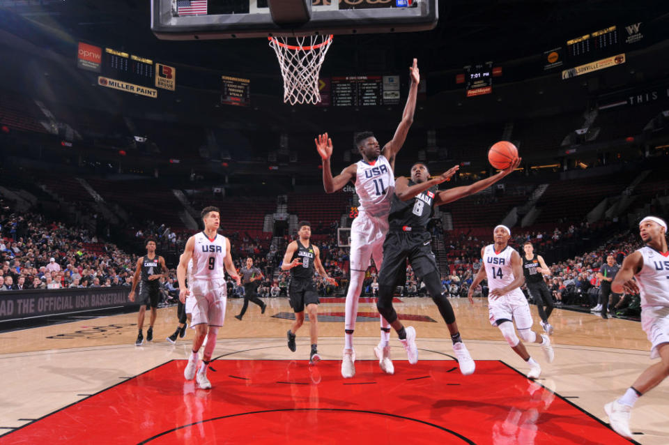 RJ Barrett goes to the hoop in international action against the U.S. (Getty Images)