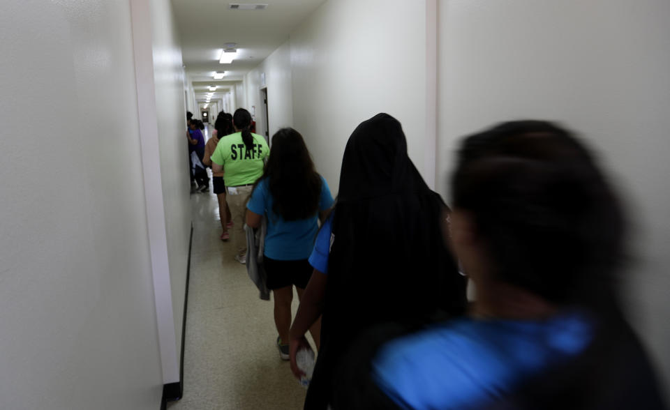 Some migrant girls detained by the U.S. government were given just one sanitary pad per day and not offered a shower or change of clothes, according to a recent lawsuit. (Photo: ASSOCIATED PRESS)