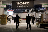 Las Vegas Convention Center exhibit contractors enter the North Hall while setting up spaces for the International Consumer Electronics Show.