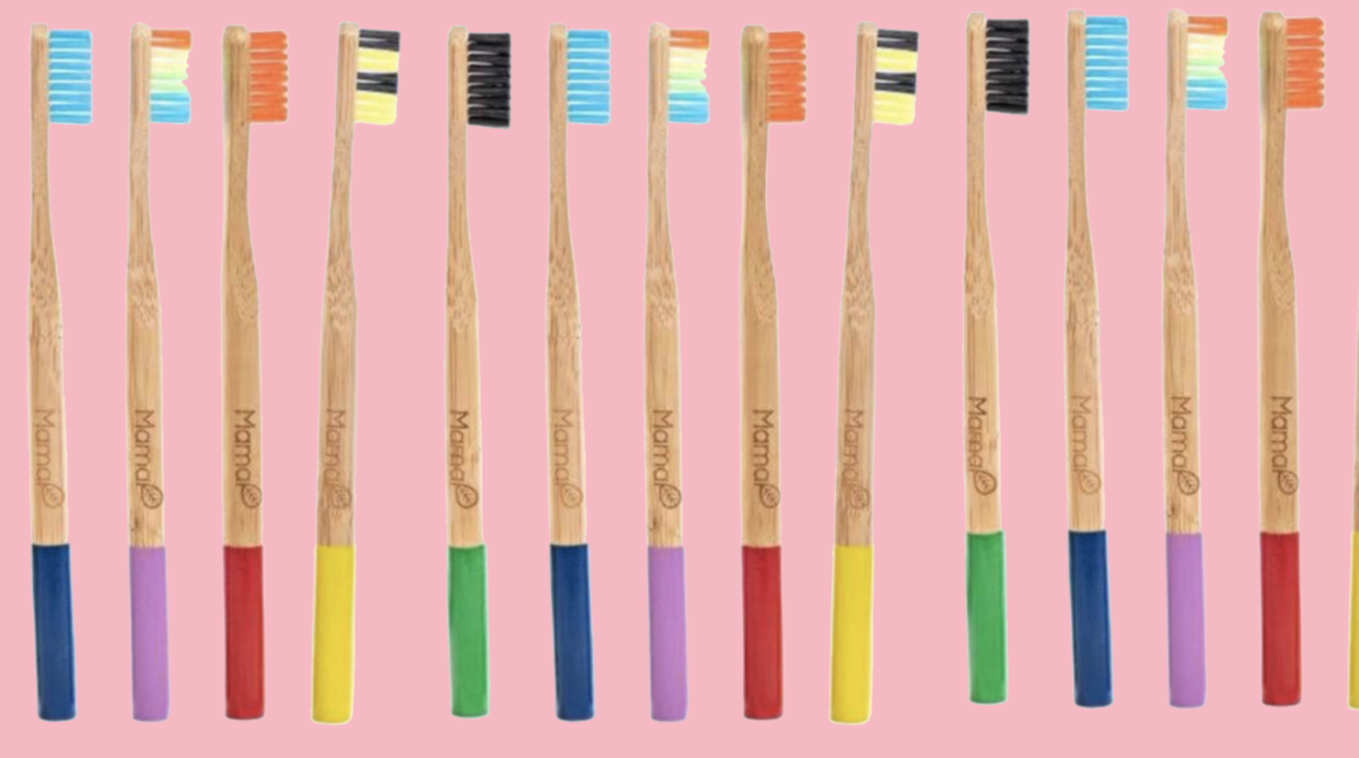 a lineup of toothbrushes 