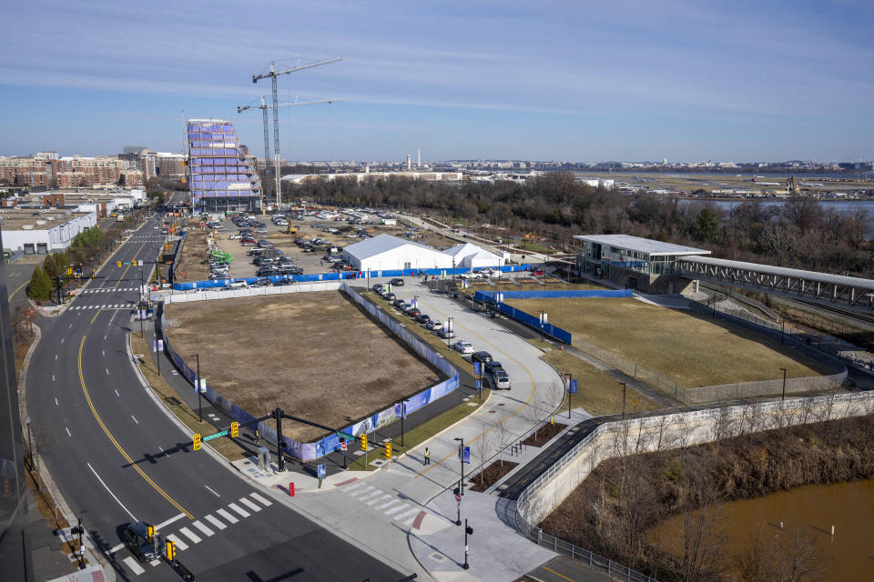 FILE - A general view showing the site for a proposed new stadium for the Washington Wizards NBA basketball team and Washington Capitals HNL hockey team, Dec. 13, 2023, in Alexandria, Va. Virginia lawmakers are set to take up legislation to enable Republican Gov. Glenn Youngkin's plan to build a new professional sports arena and entertainment district in Alexandria. The legislation is expected to be among the most high-profile issues legislators grapple with during the 2024 session, which begins Wednesday. (AP Photo/Alex Brandon, file)