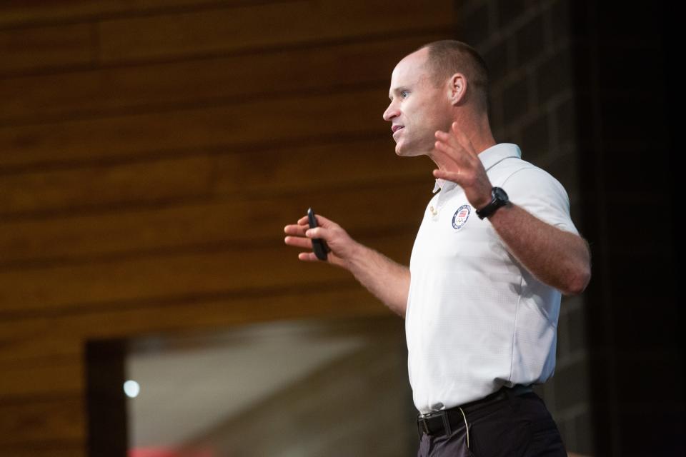 Going through Navy Seal training, Dan Cnossen said he learned out to take his mind away from long-term thoughts "one step at a time" as he talked to area high school juniors Wednesday at Shawnee Heights.