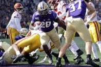 Washington's Richard Newton (28) scores on a one-yard run against Southern Cal in the first half of an NCAA college football game Saturday, Sept. 28, 2019, in Seattle. (AP Photo/Elaine Thompson)
