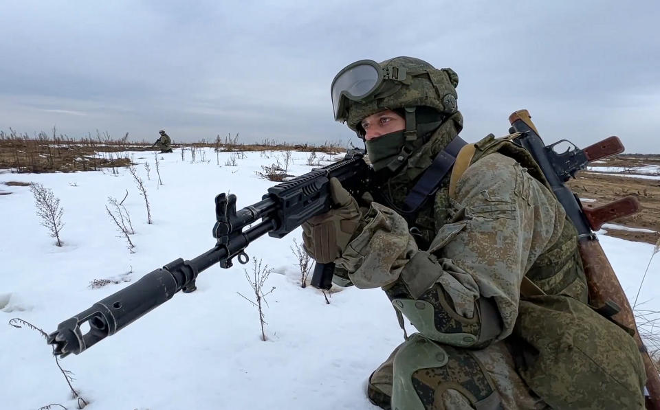 FILE - In this photo made from video provided by the Russian Defense Ministry Press Service on Saturday, Feb. 19, 2022, a Russian marine takes his position during Russia-Belarus military drills at the Obuz-Lesnovsky training ground in Belarus. Belarus President Alexander Lukashenko has welcomed thousands of Russian troops to his country, allowed the Kremlin to use it to launch the invasion of Ukraine on Feb. 24, 2022, and offered to station some of Moscow’s tactical nuclear weapons there. But he has avoided having Belarus take part directly in the fighting – for now. (Russian Defense Ministry Press Service via AP, File)