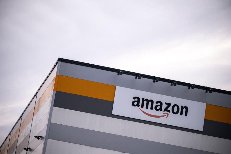 <p>Picture shows Amazon’s logo on the company’s premises in Brandizzo, near Turin</p> (AFP via Getty Images)