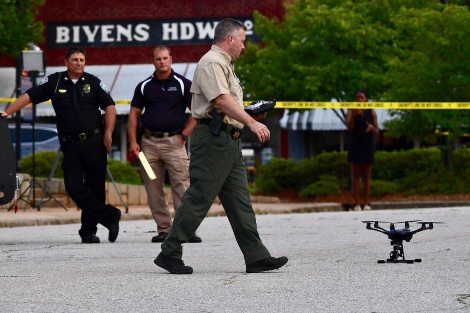 Pickens County sheriff Rick Clark uses a drone over the courthouse in downtown Pickens on Monday, July 8, 2019, after homemade devices were detonated overnight by unidentified suspects.