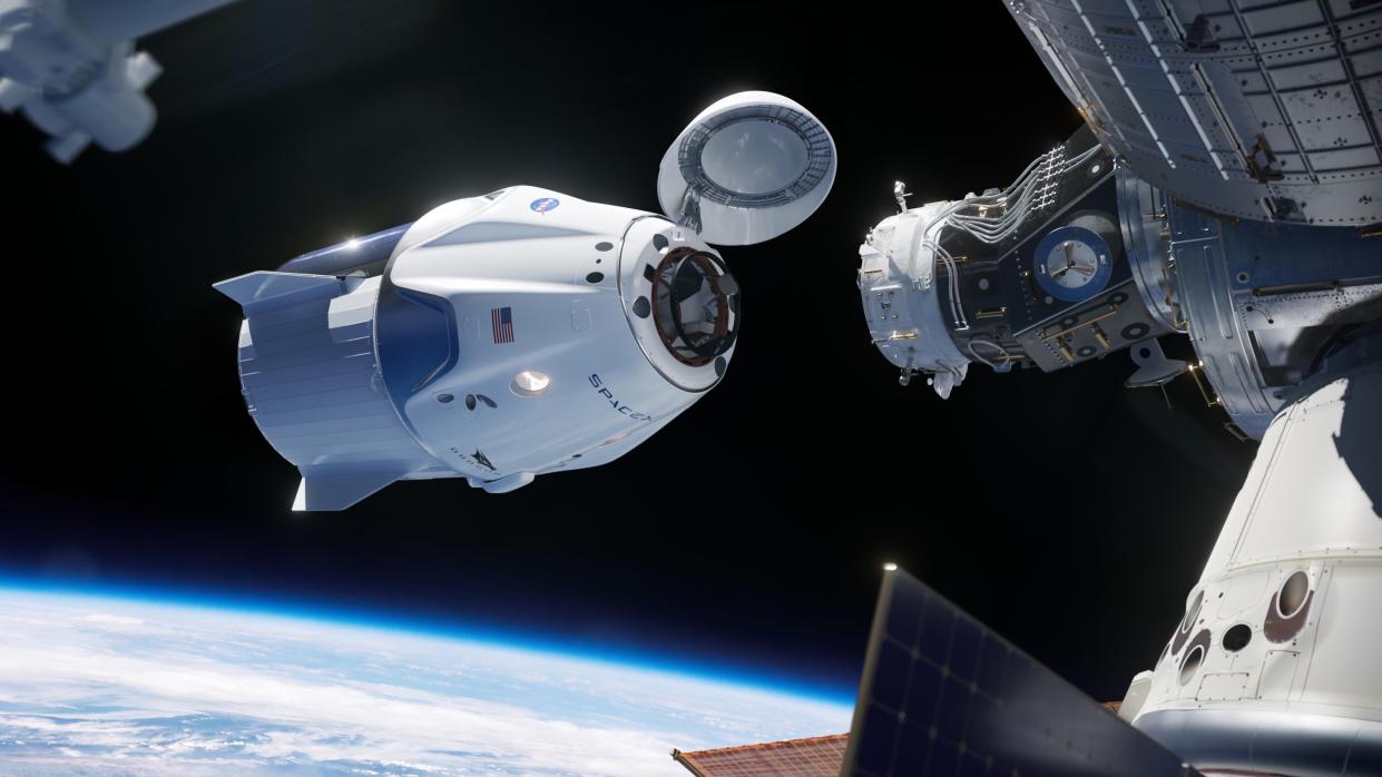 spacex crew dragon v2 spaceship international space station docking approach nasa 130608600 N05_h