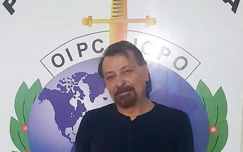 A photo taken by the Bolivian police forces, Jan 2019, shows former far-left Italian militant Cesare Battisti after he was arrested in the Bolivian city of Santa Cruz de la Sierra - Credit: AFP