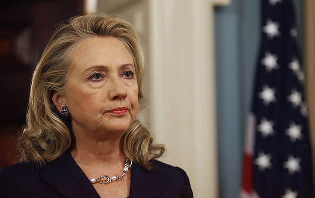 Hillary Clinton delivers remarks at the State Department in Washington on the deaths of U.S. embassy staff in Benghazi on September 12, 2012 (GARY CAMERON/REUTERS)