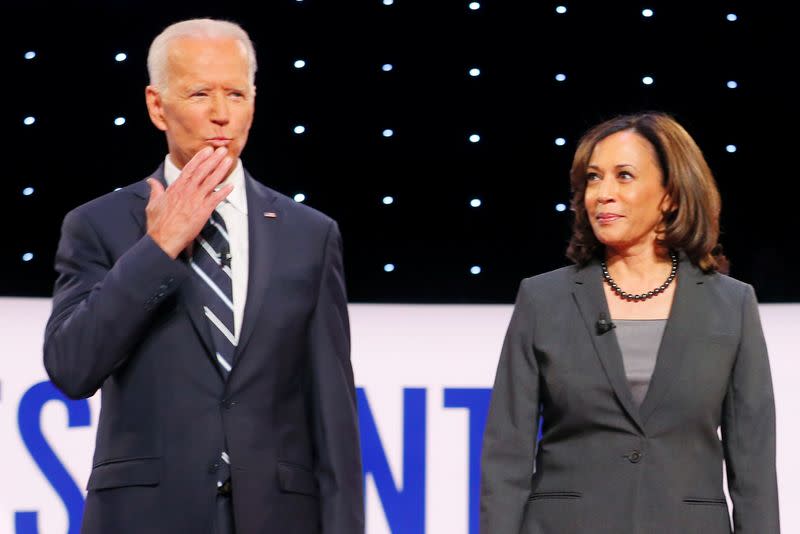 FILE PHOTO: Candidates former Vice President Joe Biden and U.S. Senator Kamala Harris take the stage on the second night of the second 2020 Democratic U.S. presidential debate in Detroit