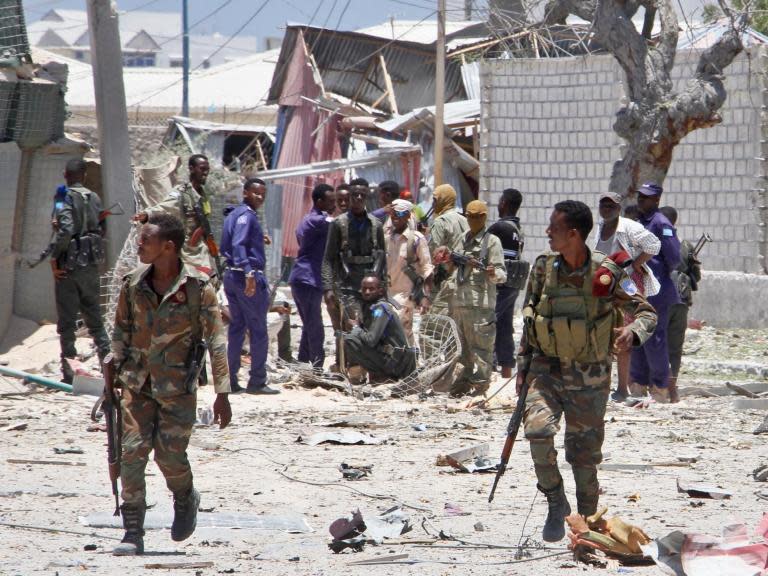 Somalia attack: Minister among nine killed after extremists detonate car bomb and storm government building