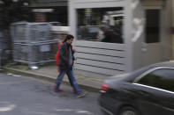 Visitors enter the Saudi Arabia Consulate in Istanbul, Turkey, Tuesday, Oct. 16, 2018. A Turkish forensics team finished a search for evidence in the Saudi Consulate in Istanbul early Tuesday morning over the unexplained disappearance and alleged slaying of Saudi writer Jamal Khashoggi. (AP Photo/Petros Giannakouris)