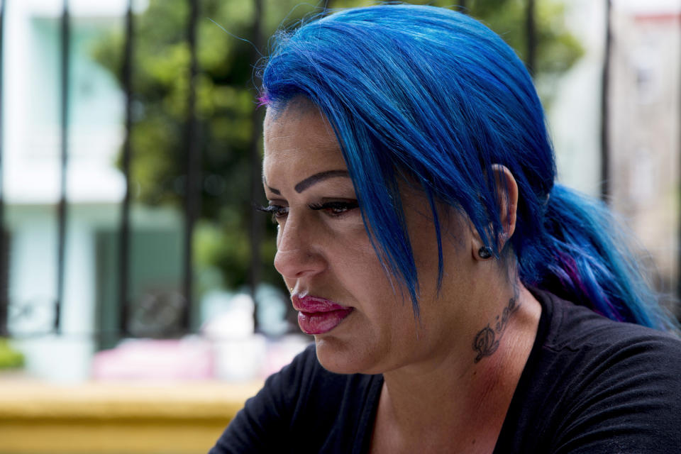 In this June 28, 2019, photo, Dianelys Alfonso, singer whose voice won her the label "Goddess of Cuba" sits during an interview with The Associated Press in Havana, Cuba. She became the center of a new phenomenon in Cuba when she publicly denounced another renowned musician, flutist and bandleader José Luis Cortés, accusing him of repeatedly hitting and raping her during her time as vocalist for NG La Banda, one of the best-known Cuban bands of the last three decades. (AP Photo/Ismael Francisco)