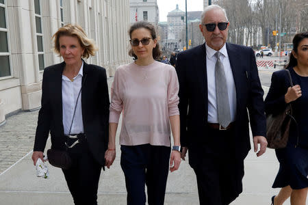 FILE PHOTO: Clare Bronfman, an heiress of the Seagram's liquor empire, arrives at the Brooklyn Federal Courthouse to face charges regarding sex trafficking and racketeering related to the Nxivm cult case in New York, U.S., April 8, 2019. REUTERS/Shannon Stapleton /File Photo