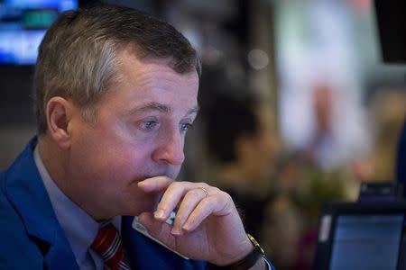 A trader works on the floor of the New York Stock Exchange April 1, 2015. REUTERS/Brendan McDermid