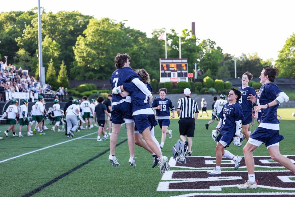 Westerly boys lacrosse celebrate winning the Division III championship on Saturday at Brown University. 6-1-24