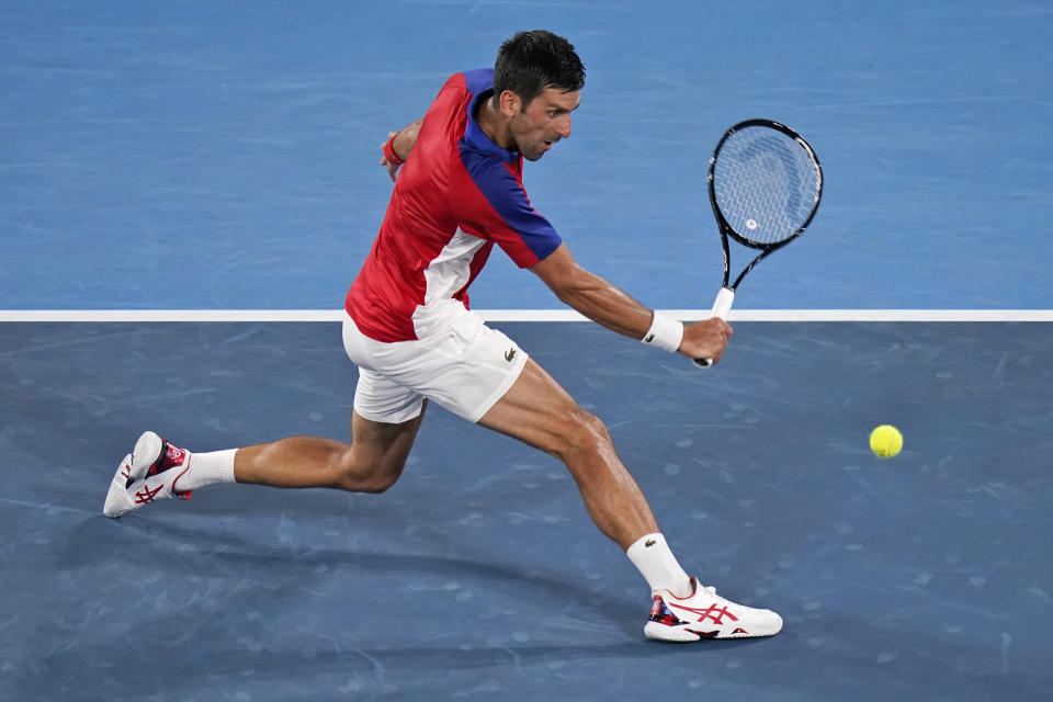 Novak Djokovic, of Serbia, plays Kei Nishikori, of Japan, during the quarterfinals of the tennis competition at the 2020 Summer Olympics, Thursday, July 29, 2021, in Tokyo, Japan. (AP Photo/Seth Wenig)