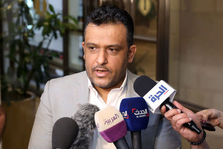 Mohammad Al Amrani, representative of the Yemeni government delegation, speaks to the media during a new round of talks between Yemen's warring parties, in Amman, Jordan May 16, 2019. REUTERS/Muhammad Hamed