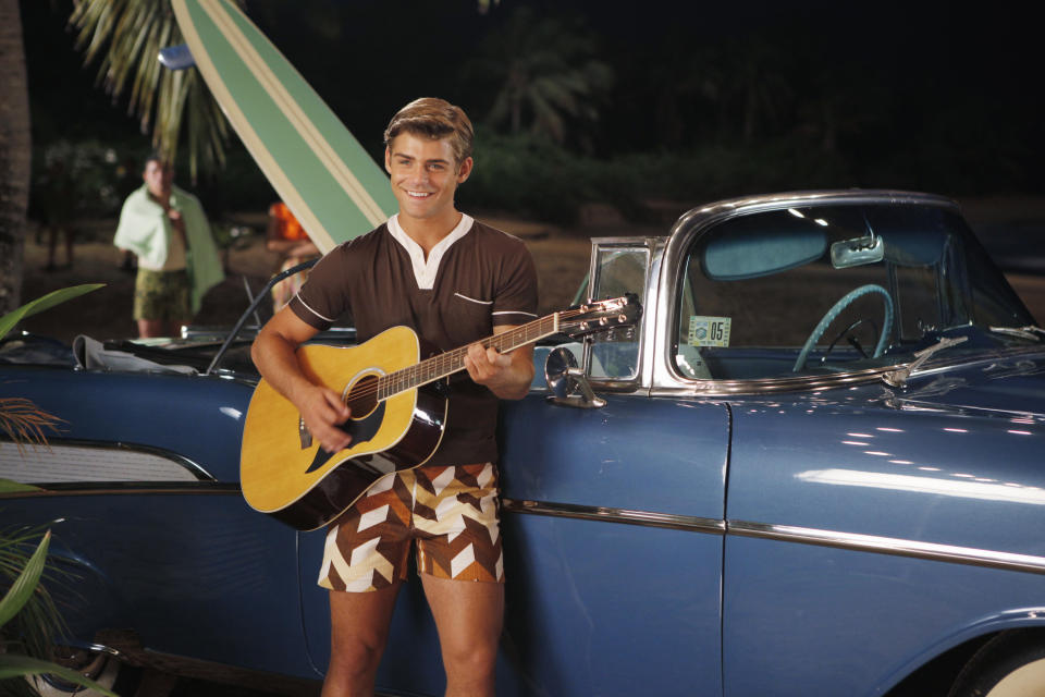 In this publicity image released by Disney Channel, Garrett Clayton appears in a scene from the film "Teen Beach Movie." The film, a modern take on classic beach party movies, airs Friday, July 19 at 8 p.m. EST on the Disney Channel. (AP Photo/Disney Channel, Francsico Roman)