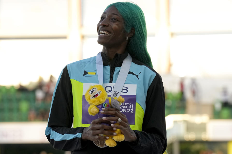 Gold medalist Shaunae Miller-Uibo, of Bahamas, poses during a medal ceremony for wins the final of the women's 400-meter run at the World Athletics Championships on Friday, July 22, 2022, in Eugene, Ore.(AP Photo/Gregory Bull)