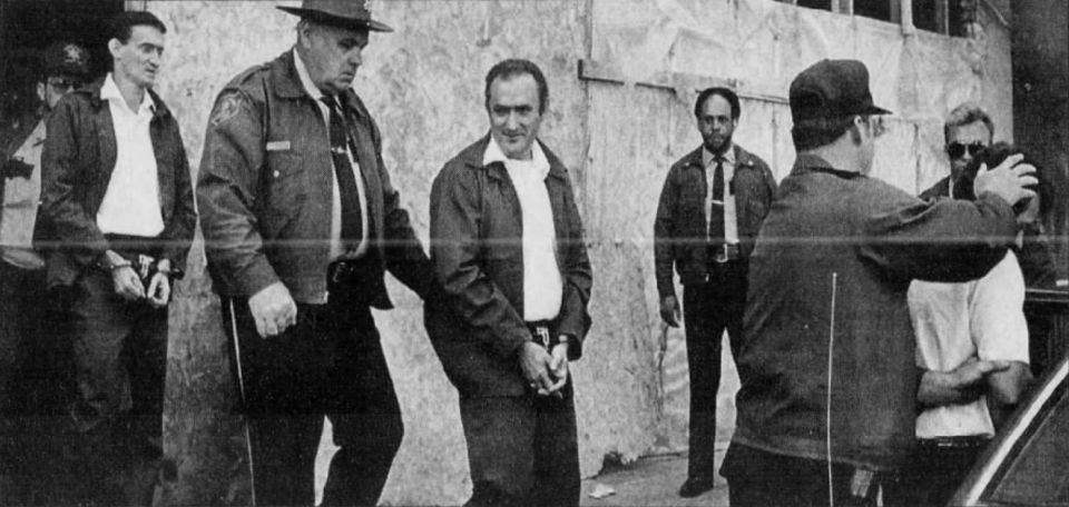 From left, brothers Norman L. Johnston, Bruce A. Johnston Sr. and David K. Johnston are escorted from the Chester County Courthouse in Pennsylvania after an appeals hearing in 1987.