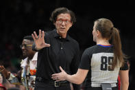 Atlanta Hawks head coach Quin Snyder agrues with official Dannica Mosher (89) during the first half of an NBA basketball game against the Boston Celtics Thursday, March 28, 2024, in Atlanta. (AP Photo/John Bazemore)