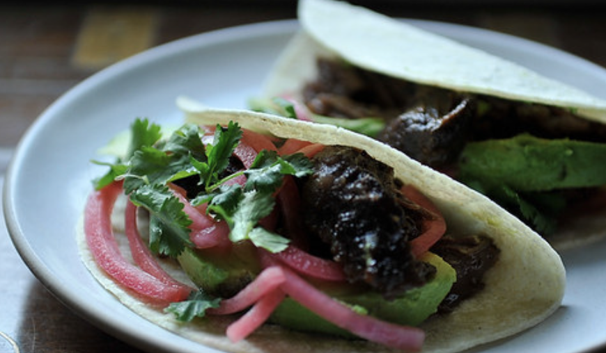 The beef cheeks end up marbled and melting after over three hours in the oven. Recipe: Barbacoa Beef Cheek Tacos 