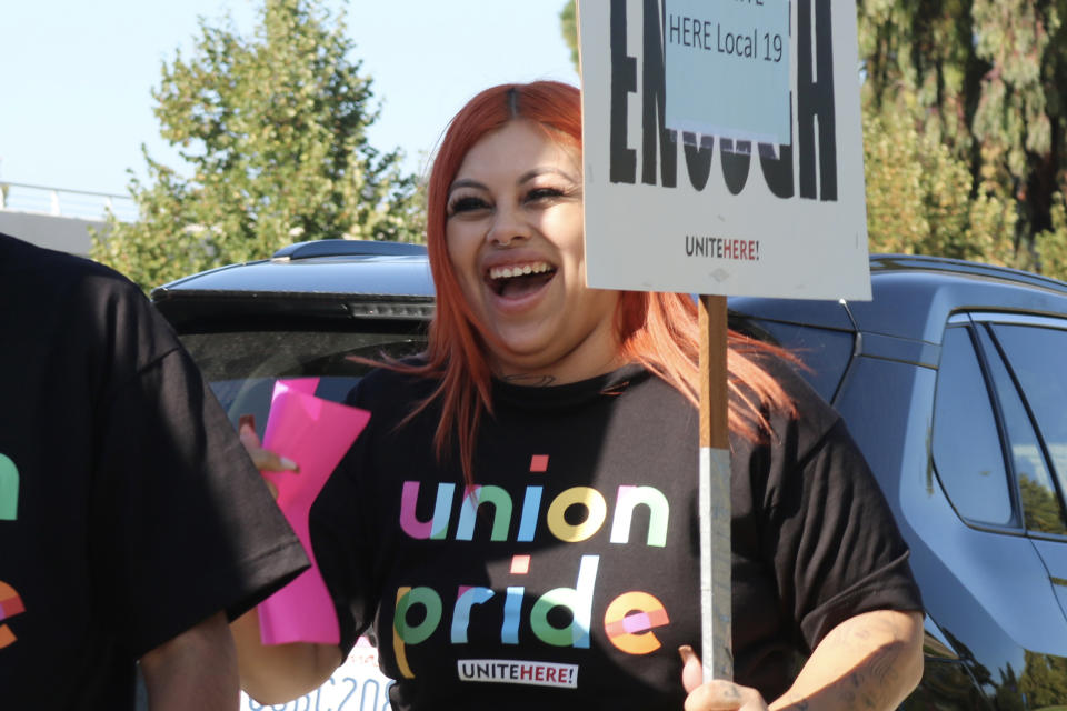 Cristalyn Barragan smiles on the picket line. (Unite Here)