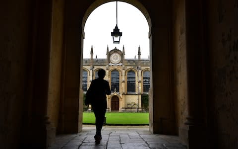  A tourist visits All Souls College on September 20, 2016 - Credit: Carl Court/Getty Images Europe 