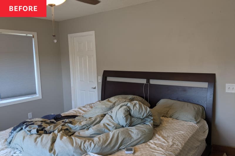 gray minimally furnished bedroom before remodel