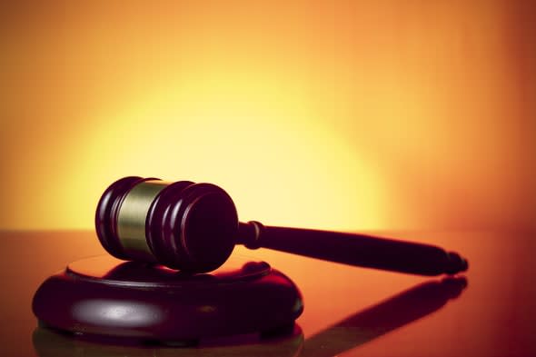judge gavel on orange background