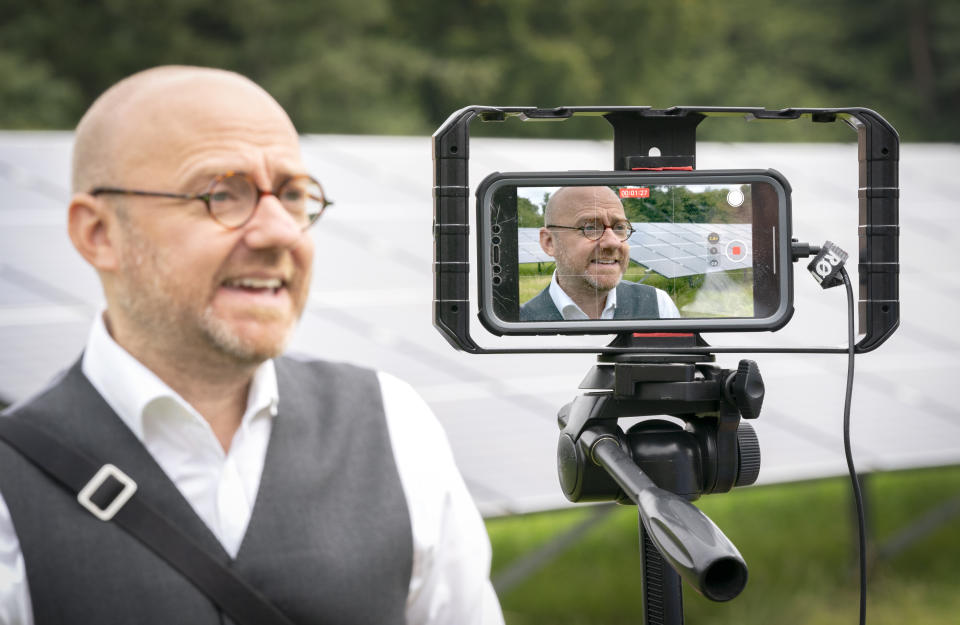 <p>Scottish Greens co-leader Patrick Harvie speaks to the media during a visit to the site of a new solar farm at the University of Edinburgh Easter Bush Campus to discuss how the proposed co-operation agreement between the party and the Scottish Government will allow Greens to champion a bold response to climate crisis. Picture date: Friday August 27, 2021.</p>
