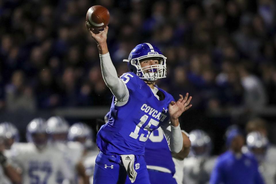 Covington Catholic quarterback Evan Pitzer (15) throws a pass against Highlands in the second half at Covington Catholic High School Oct. 14, 2022.