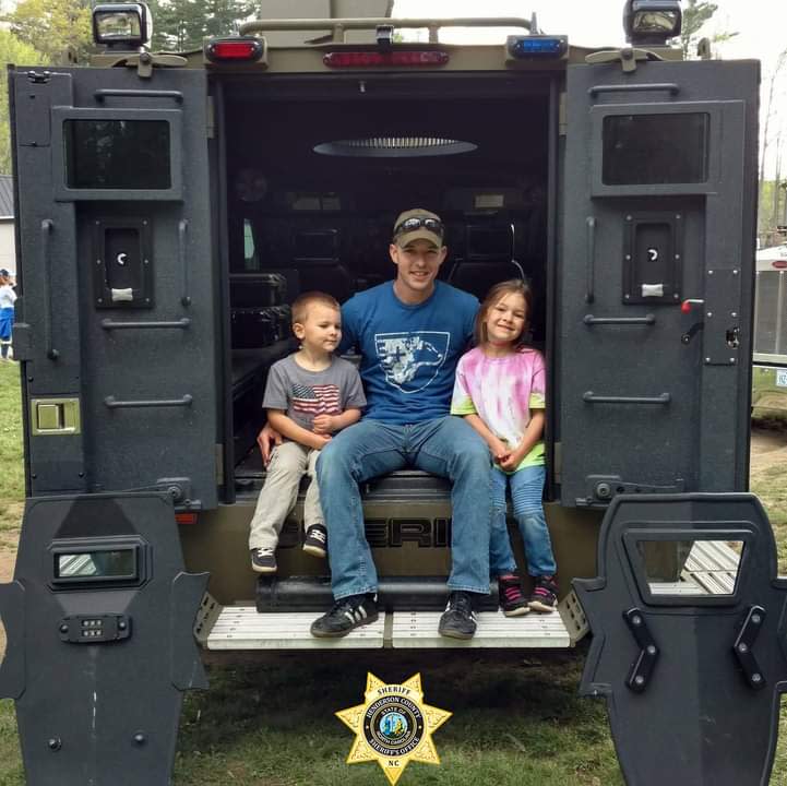 Ryan Hendrix poses with his children.