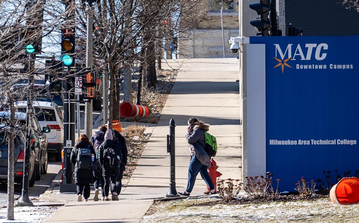 A student walks across the Milwaukee Area Technical College downtown campus on Feb. 28.