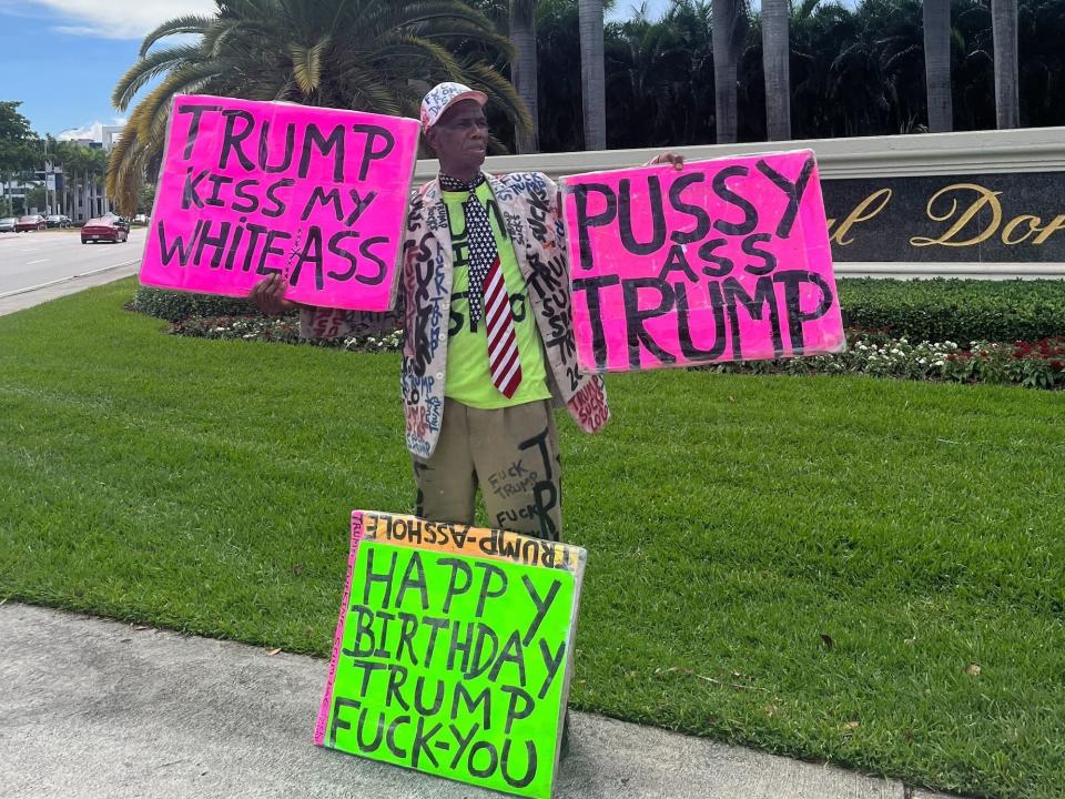 Trump protestor outside the former president's golf club in Doral.