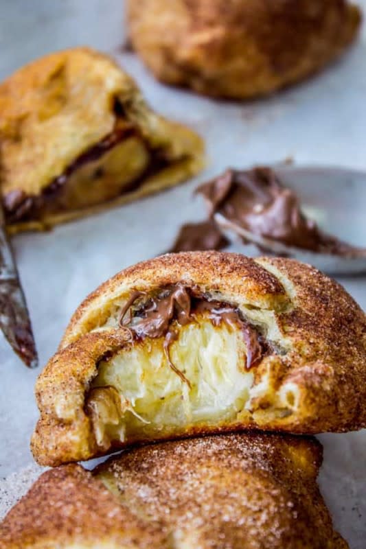 <p>Stuff a buttery crescent roll with banana and a schmear of Nutella, roll it in cinnamon sugar, and bake. This is the easiest recipe for happiness, in 10 minutes flat.</p><p><strong>Get the recipe: <a href="https://thefoodcharlatan.com/nutella-and-banana-stuffed-crescent-rolls-recipe/" rel="nofollow noopener" target="_blank" data-ylk="slk:Nutella and Banana Stuffed Crescent Rolls;elm:context_link;itc:0;sec:content-canvas" class="link rapid-noclick-resp"><em>Nutella and Banana Stuffed Crescent Rolls</em></a></strong></p>