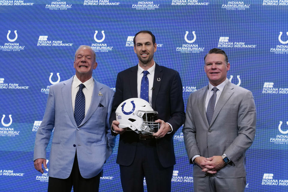 Shane Steichen, middle, Indianapolis Colts owner Jim Irsay, left, and Colts general manager Chris Ballard, pose for a photo following a news conference, Tuesday, Feb. 14, 2023, in Indianapolis. Steichen was introduced as the Colts new head coach. (AP Photo/Darron Cummings)
