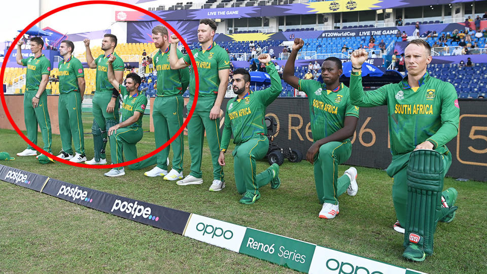 Seen here, South Africa's players pose for a photo before their T20 World Cup match against Australia.