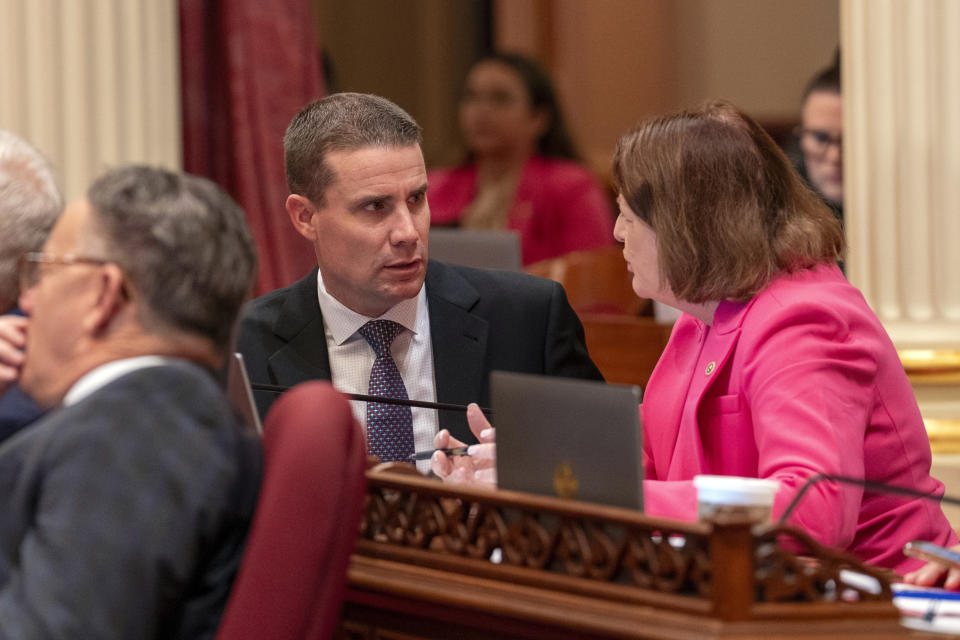 State Senate President Pro Tempore Designate Mike McGuire, left, of Healdsburg, meets with current Pro Tempore Toni Atkins in the state Senate Chambers in Sacramento, Calif., Thursday, Jan. 25, 2024. McGuire will replace Atkins when he is sworn-in Monday Feb. 5, 2024. (AP Photo/Rich Pedroncelli)