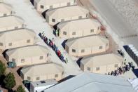 Immigrant children, many of whom have been separated from their parents under a new "zero tolerance" policy by the Trump administration, are being housed in tents next to the Mexican border in Tornillo, Texas, U.S., June 18, 2018. REUTERS/Mike Blake/Files