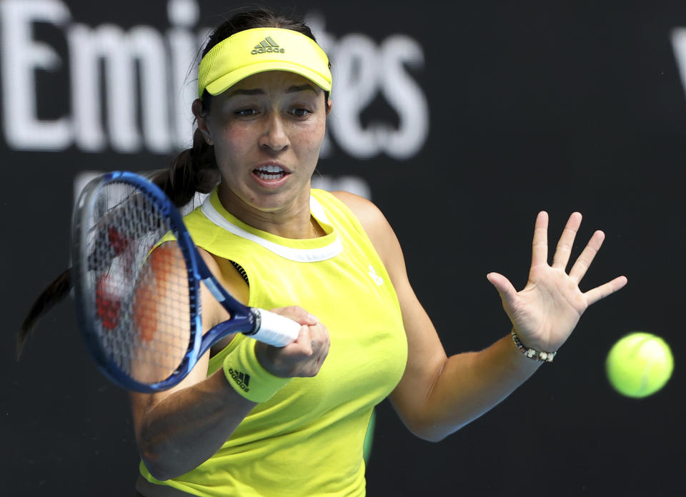 United States' Jessica Pegula hits a forehand to France's Kristina Mladenovic during their match at the Australian Open tennis championships in Melbourne, Australia, Saturday, Feb. 13, 2021. (AP Photo/Hamish Blair)