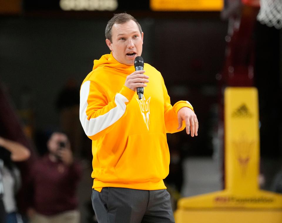 Dec 4, 2022; Tempe, Arizona, USA;  Arizona State football coach Kenny Dillingham talks to the basketball fans during Pac 12 play between Arizona State and Stanford at Desert Financial Arena. Mandatory Credit: Michael Chow-Arizona Republic