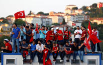 <p>People attend a ceremony marking the first anniversary of the attempted coup at the Bosphorus Bridge in Istanbul, Turkey, July 15, 2017. (Photo: Osman Orsal/Reuters) </p>